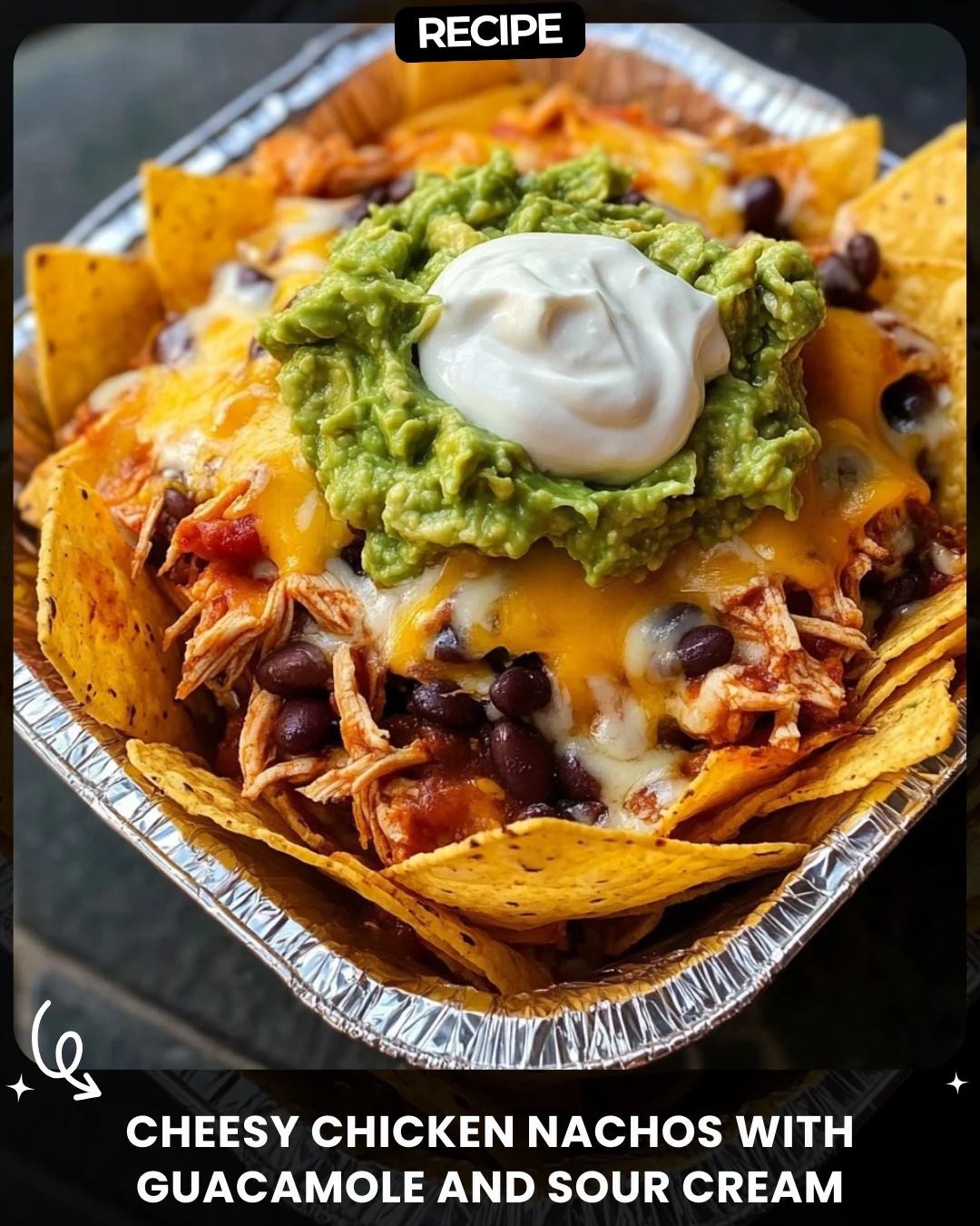 Cheesy Chicken Nachos with Guacamole and Sour Cream
